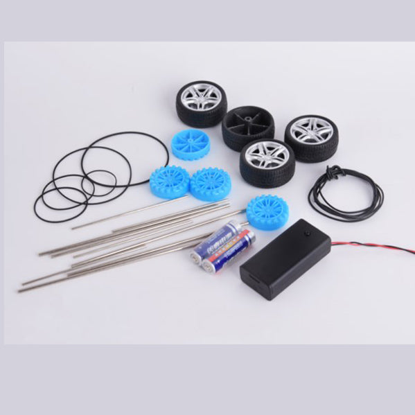 Kit con engranajes de plástico, poleas, correas, motores eléctricos y ruedas